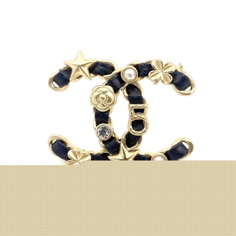 Ch*el brooches